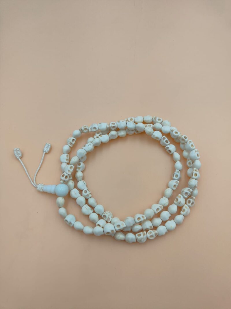 Skull carving mala made in Nepal