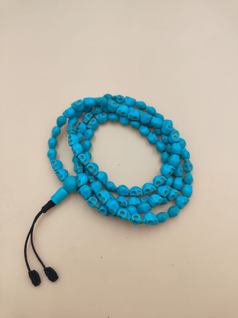 Skull in turquoise stone with 108 beads mala
